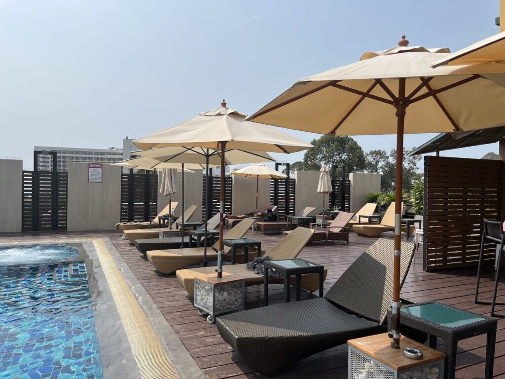 April Suites pool lounge chairs