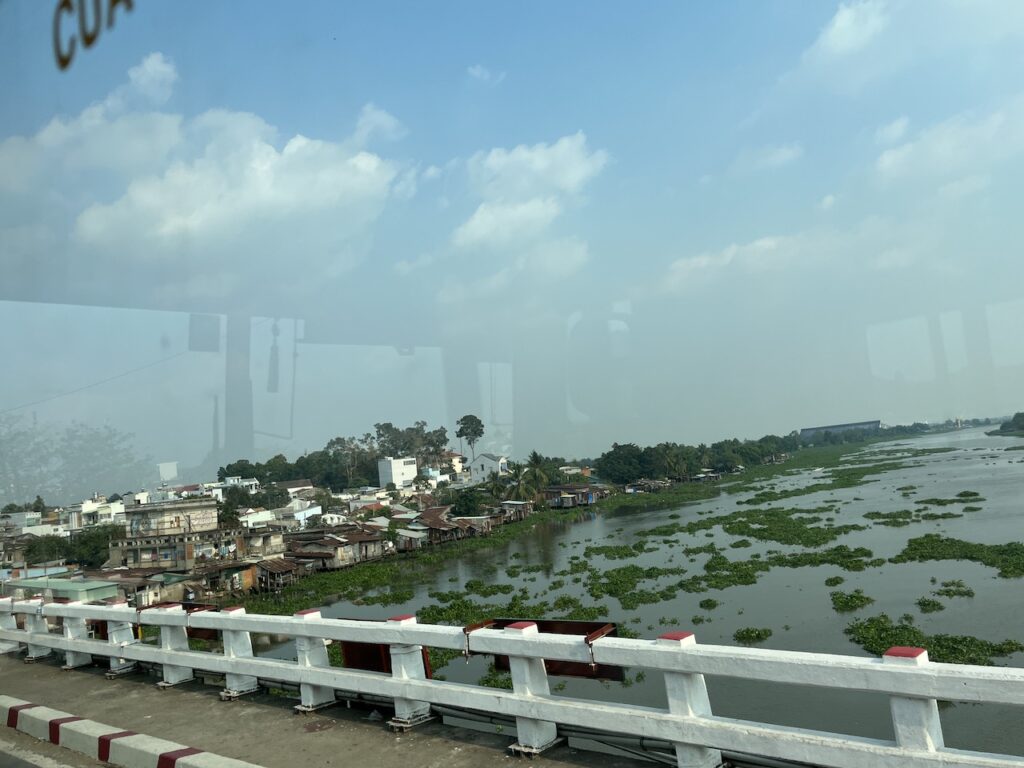 Scenes of travel by bus from Phnom Penh to Saigon