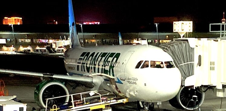 Frontier airlines jet at gate